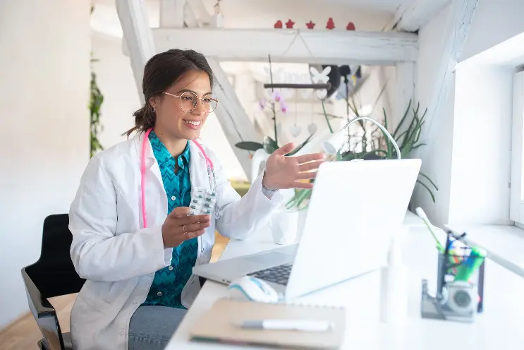 Doctor talking to patients while at home