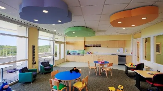 Empty playroom in a childrens hospital with colorful decorations.