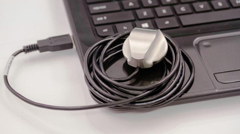 PCP-USB Stethoscope Digital stethoscope resting on a laptop